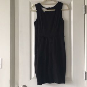 Adorable Maggie London black pocketed dress